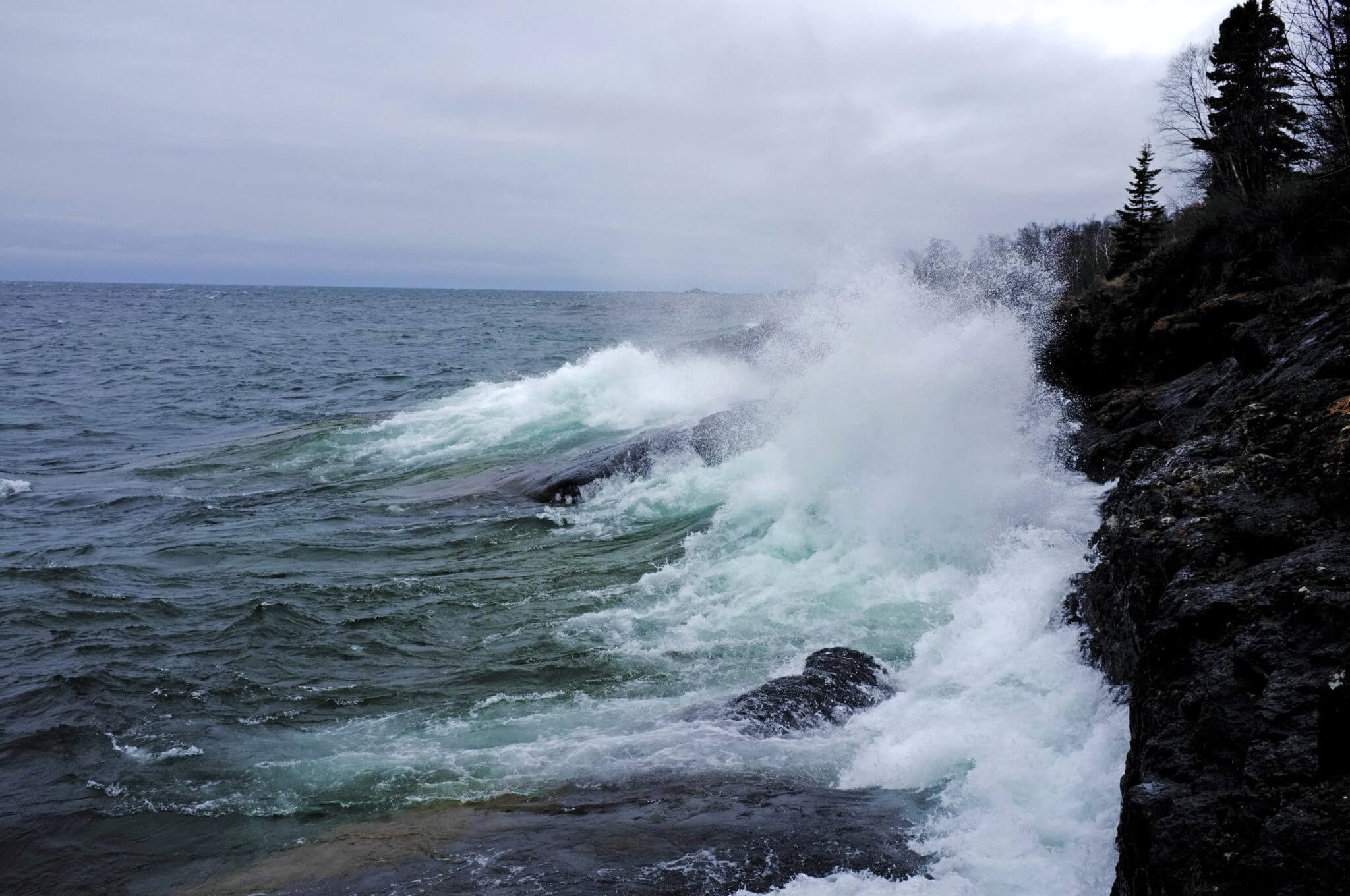 Waves crashing near mouth of the Temperance river